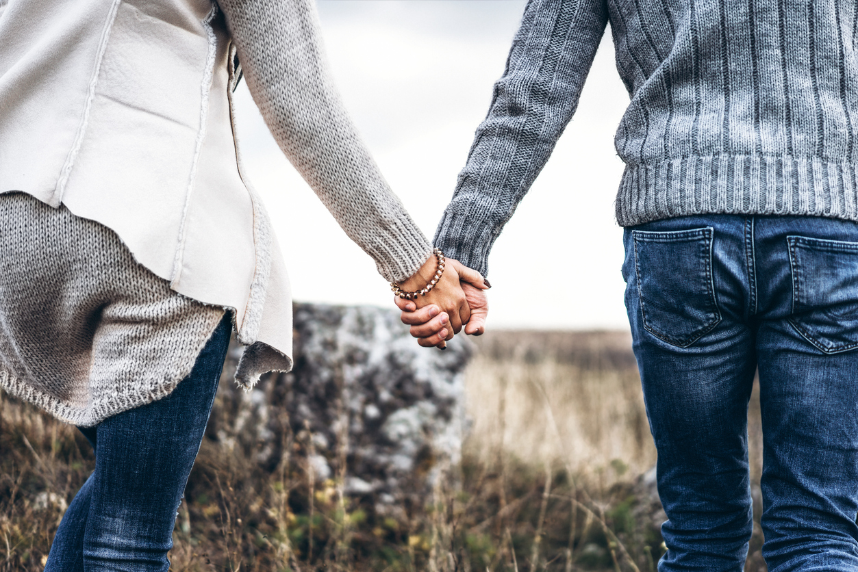 Pretty young couple in love outdoor